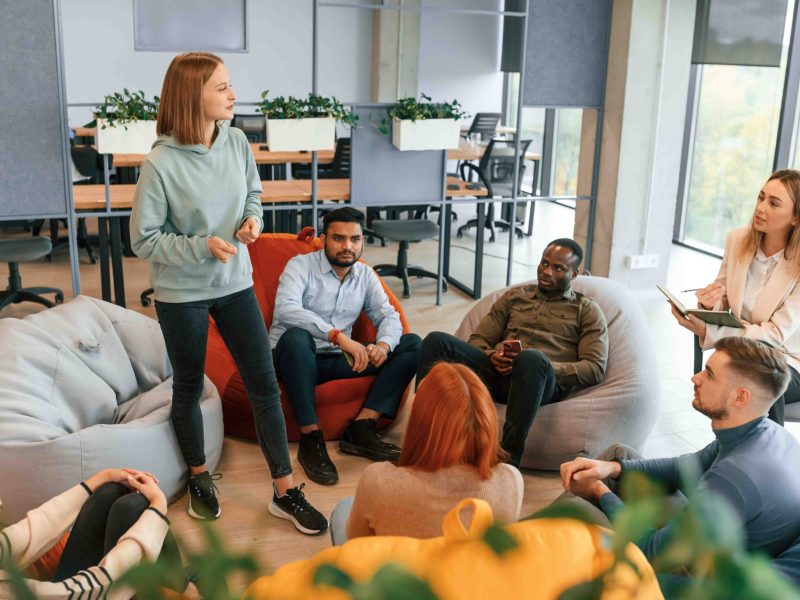 Group of people are having therapy meeting together.